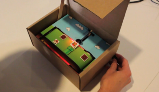 Vídeo game em caixa de papelão